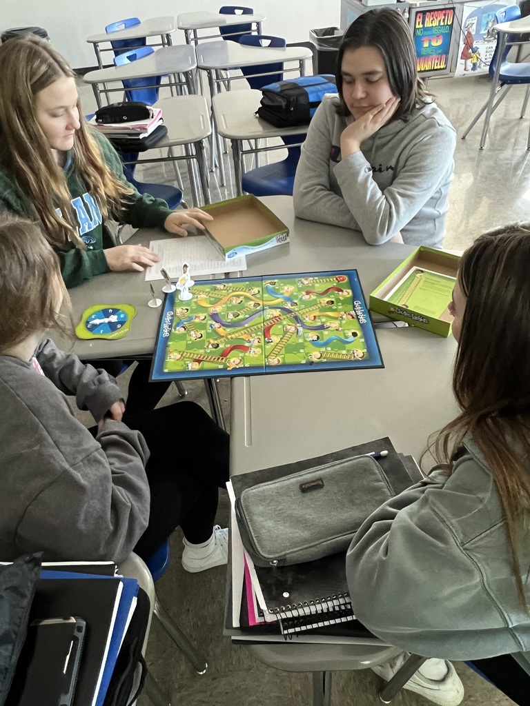 Spanish 2 got to practice their new stem changing verbs by playing Jenga and Chutes and Ladders today!